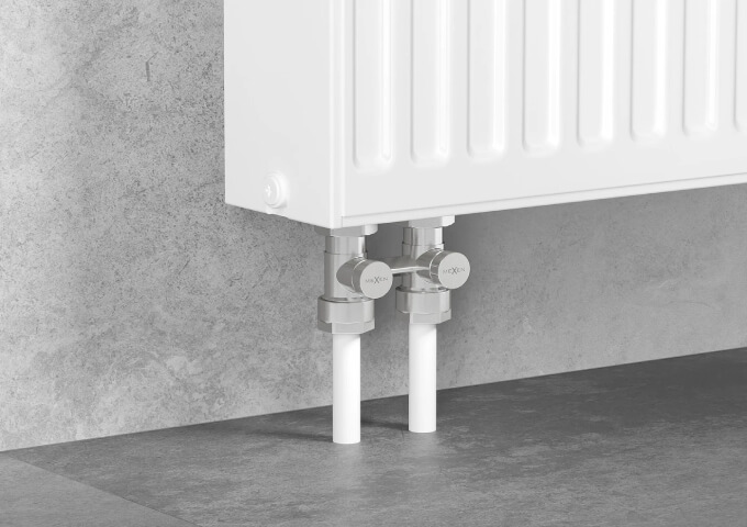Witte tweepijps radiatorkraan