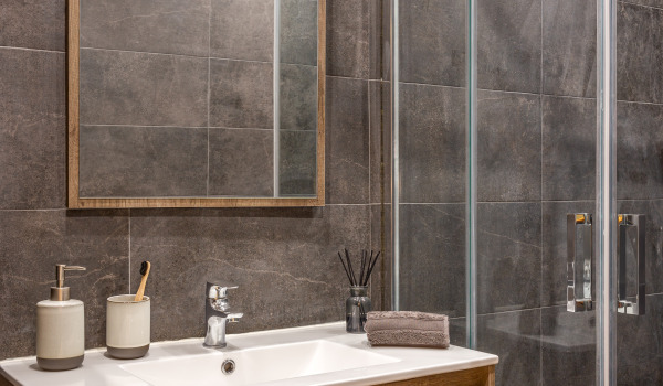 Op welke hoogte moeten douchemandjes worden opgehangen?