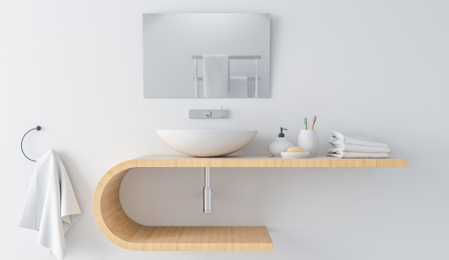 Waar hang je de handdoek bij de wastafel?