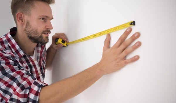 Hoe bereken je het aantal tegels voor een muur?