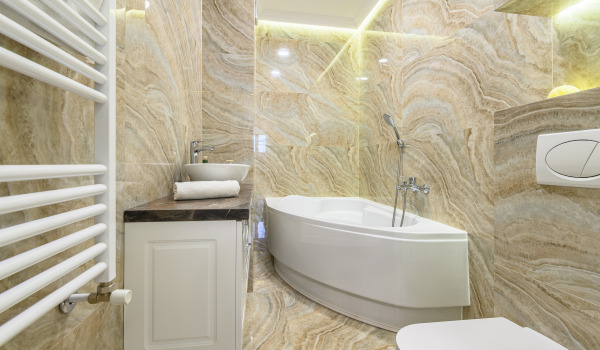 Wat voor ombouw kiezen voor een hoekbad?